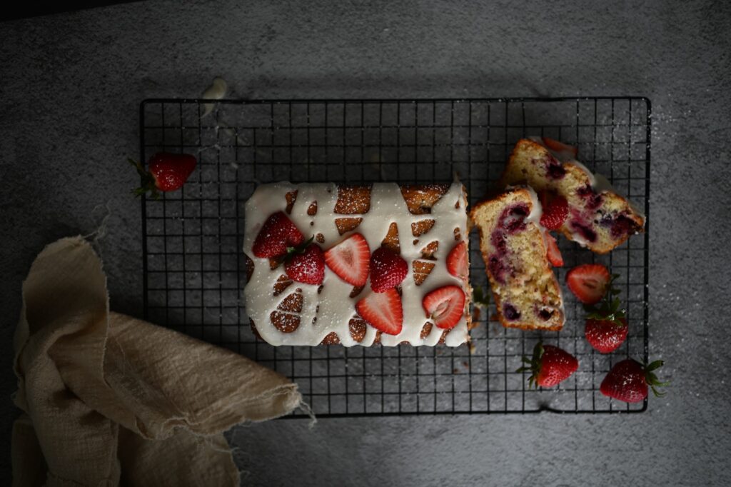 Slices of Strawberry Cake on Black Cooling Rack